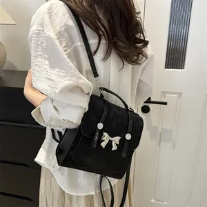 Minimalistischer schwarzer Damenrucksack mit eleganter Schleife und koreanischem Design.