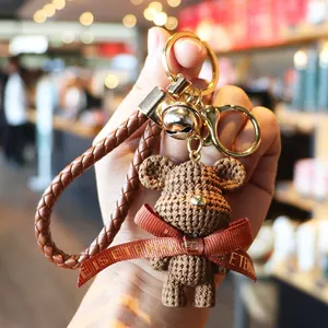Cute brown woven texture resin bear keychain with a red love ribbon bow for bags