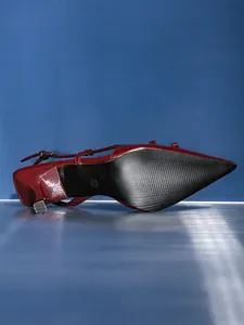 Elegant wine red slingback kitten heels with double bow and pointed toe detail.