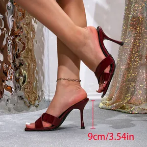 Elegant burgundy patent leather high heel mules with 9cm stiletto and cross strap