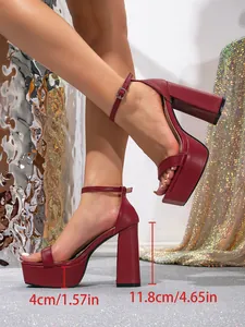 Detail view of burgundy platform sandals with 11.8cm chunky high heel and square toe