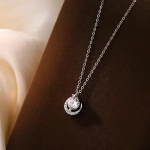 Close-up of S925 silver necklace with sparkling crescent moon and star pendant details