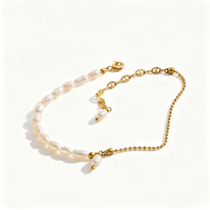 Elegant 18K gold plated stainless steel bracelet featuring natural white freshwater pearls