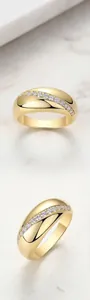 Detail shot of gold-plated S925 silver ring featuring sparkling moissanite stones in a pavé setting