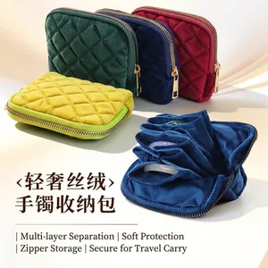 Velvet quilted jewelry pouch with multiple internal storage compartments for bangles