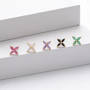 Detail view of five multi-colored marquise zircon four-petal flower silver stud earrings.