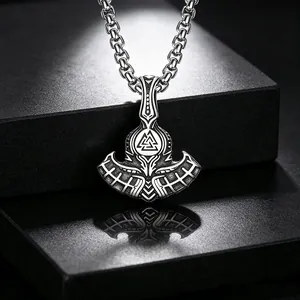 Close-up of retro Viking Thor's axe pendant necklace with Valknut symbol in stainless steel