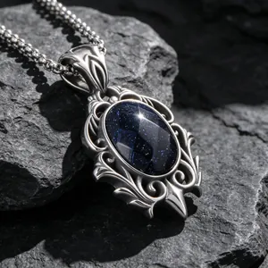 Collier pendentif goutte d'eau style palais rétro en pierre de sable bleu et titane.