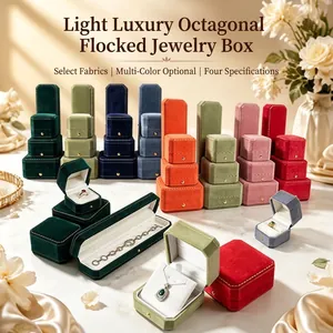 Detailed view of colorful octagonal velvet jewelry boxes for rings and necklaces