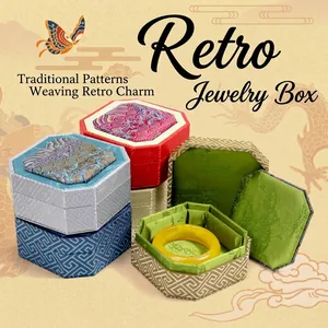 Detailed view of vintage octagonal fabric-covered jewelry gift boxes with traditional patterns