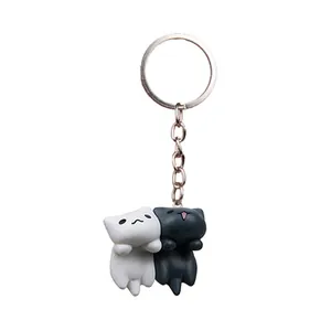 Cute black and white cartoon cat keychain for bags and car keys, creative pair pendant