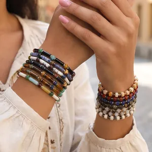 Close-up of bohemian handmade semi-precious stone and Czech bead stackable bracelets