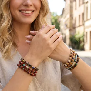 Close-up of bohemian handmade multi-layered bracelets with colorful semi-precious stones