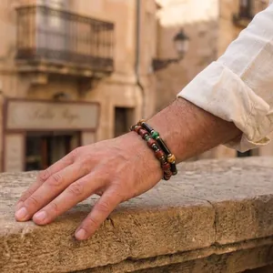Handmade beaded bracelet set with Czech beads and semi-precious stones on man's wrist