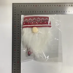 Christmas gnome wine bottle cover with red knitted hat and white beard