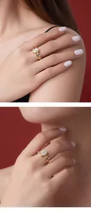 Detailopname van een gouden S925 zilveren ring met hartvormige moissaniet op een model