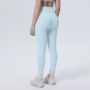 Vista posteriore dettagliata dei leggings da yoga azzurri a vita alta per lo sport