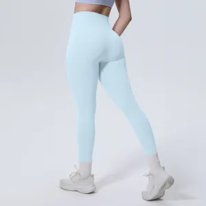 Dettaglio dei leggings da yoga a vita alta azzurri per il fitness e l'allenamento