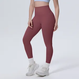 Dettaglio dei leggings a vita alta color malva con effetto modellante e tessuto morbido.