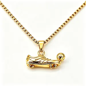 Detailed close-up of a gold stainless steel football cleat and ball pendant necklace.