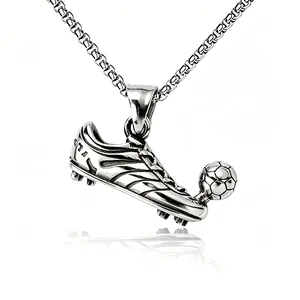 Detailed shot of a stainless steel soccer cleat pendant with a ball on a box chain