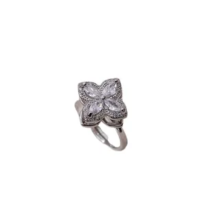 Elegant silver-tone four-leaf flower open ring with marquise-cut sparkling zircons