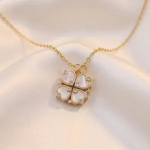 Elegante collar trébol magnético 2 en 1 con corazones de nácar blanco y oro