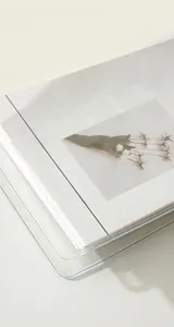 Detailed view of the embossed edges on a clear PVC loose-leaf binder cover