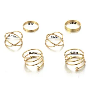 Detail view of 6-piece gold ring set with precise diameter measurements in inches