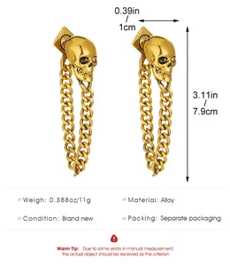 Macro detail of Gothic gold skull chain dangle earrings with dimensions 7.9cm x 1cm