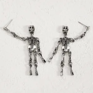Gothic silver-tone skeleton earrings with movable joints and hollow punk design detail