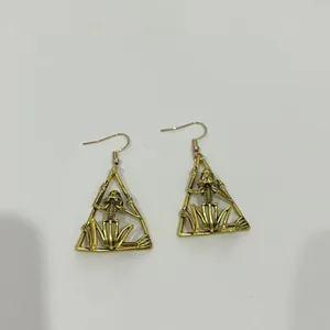 Unique gothic gold skeleton dangle earrings in triangle frame for Halloween punk style accessories