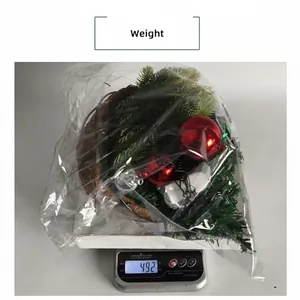 Detail view showing artificial Christmas hanging basket weight of 492 grams