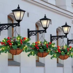 Artificial Christmas hanging baskets with LED lights and festive red berries