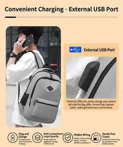 Vue détaillée de la borne de recharge USB externe sur un sac à dos de voyage gris élégant