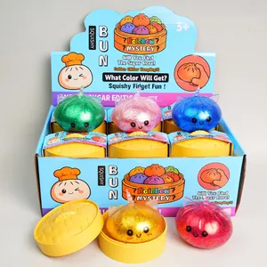 Colorful glitter squishy bun fidget toy set in yellow steamer boxes for kids stress relief