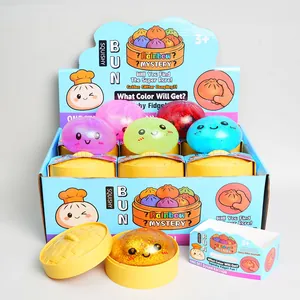 Detailed view of colorful maltose bun squishy fidget toys with plastic steamers