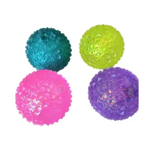 Detailed view of four colorful glitter spiky squeeze balls for stress relief in vibrant colors