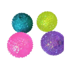 Set of four colorful spiky glitter stress balls for sensory play and stress relief
