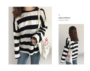 Voor- en achteraanzicht van een ruimvallend zwart-wit gestreept T-shirt met lange mouwen