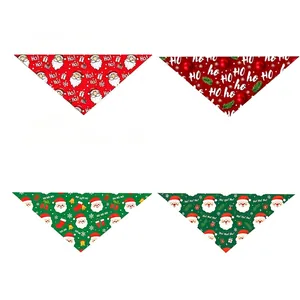 Set of four Christmas pet bandanas with Santa Claus and festive holiday prints