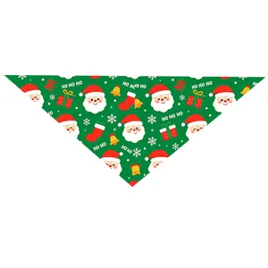 Macro detail of the festive Santa Claus and snowflake pattern on this pet bandana scarf