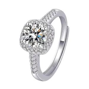 Classic square halo engagement ring featuring a round brilliant cut diamond simulant in silver