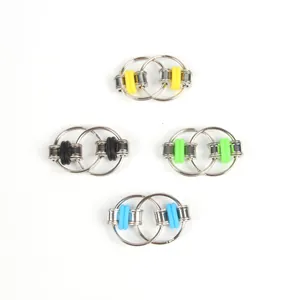 Group of four colorful fidget flipper chains featuring metal rings and silicone bands