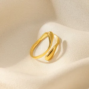 Elegant minimalist gold double-layered open ring featuring a unique teardrop design