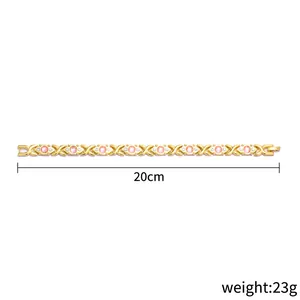 Gold-tone fashion XO energy magnet bracelet with pink crystals, 20cm length, 23g