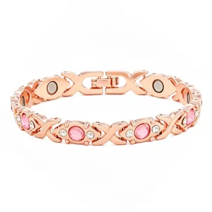 Rose gold energy magnetic bracelet with pink rhinestones and X-shaped links