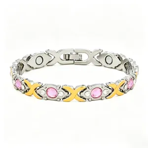 Elegant women's magnetic therapy bracelet with pink rhinestones and golden X-links