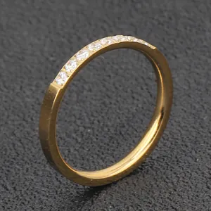 Close-up of 2mm 18K gold plated stainless steel ring with pavé-set clear stones