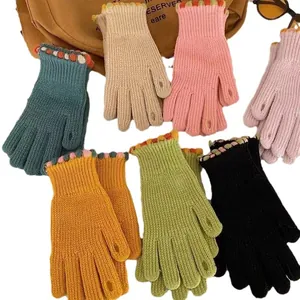 Colorful knitted winter gloves with two-finger touchscreen friendly design for adults